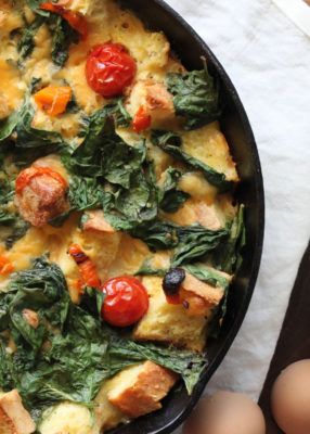 Cheese and vegetable strata in cast iron pan